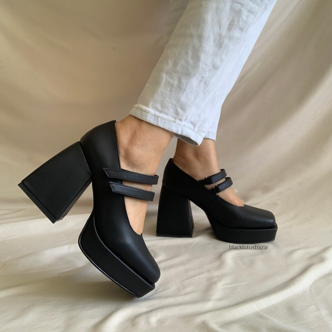 Zapatos negros de doble látigo